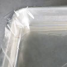 HALF SIZE PLASTIC SHEET PAN LINER / 18 X 13 (200/CS)