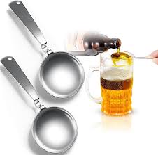 STAINLESS STEEL BLACK AND TAN SPOON