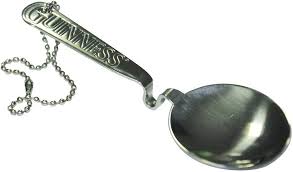 STAINLESS STEEL BLACK AND TAN SPOON