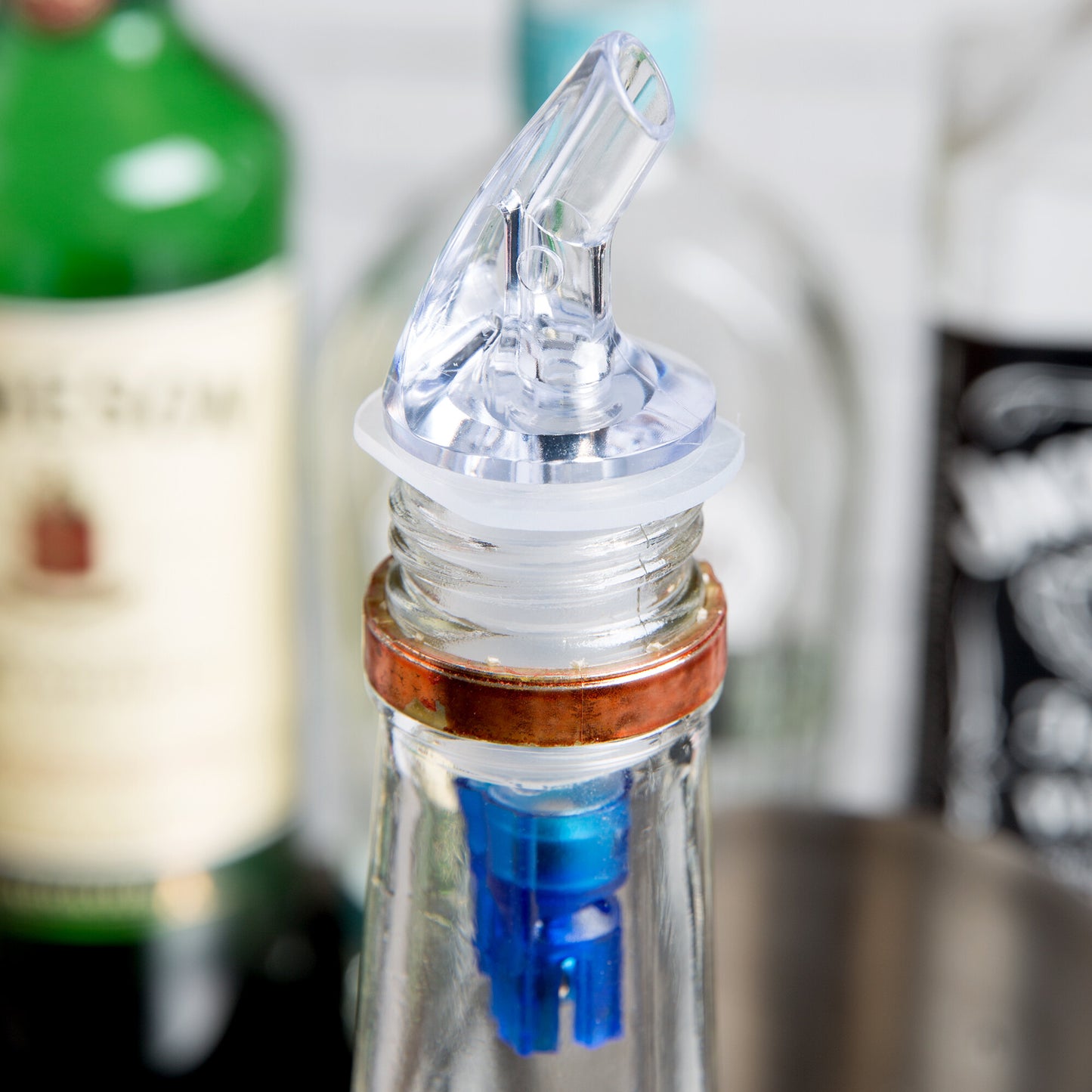 .875 OZ. CLEAR SPOUT / BLUE TAIL MEASURED LIQUOR POURER WITHOUT COLLAR - 12/PACK