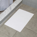 HOFFMASTER 851000 14 1/4" X 20" HOTEL AND MOTEL DISPOSABLE WHITE BATH MAT - (500/CS)