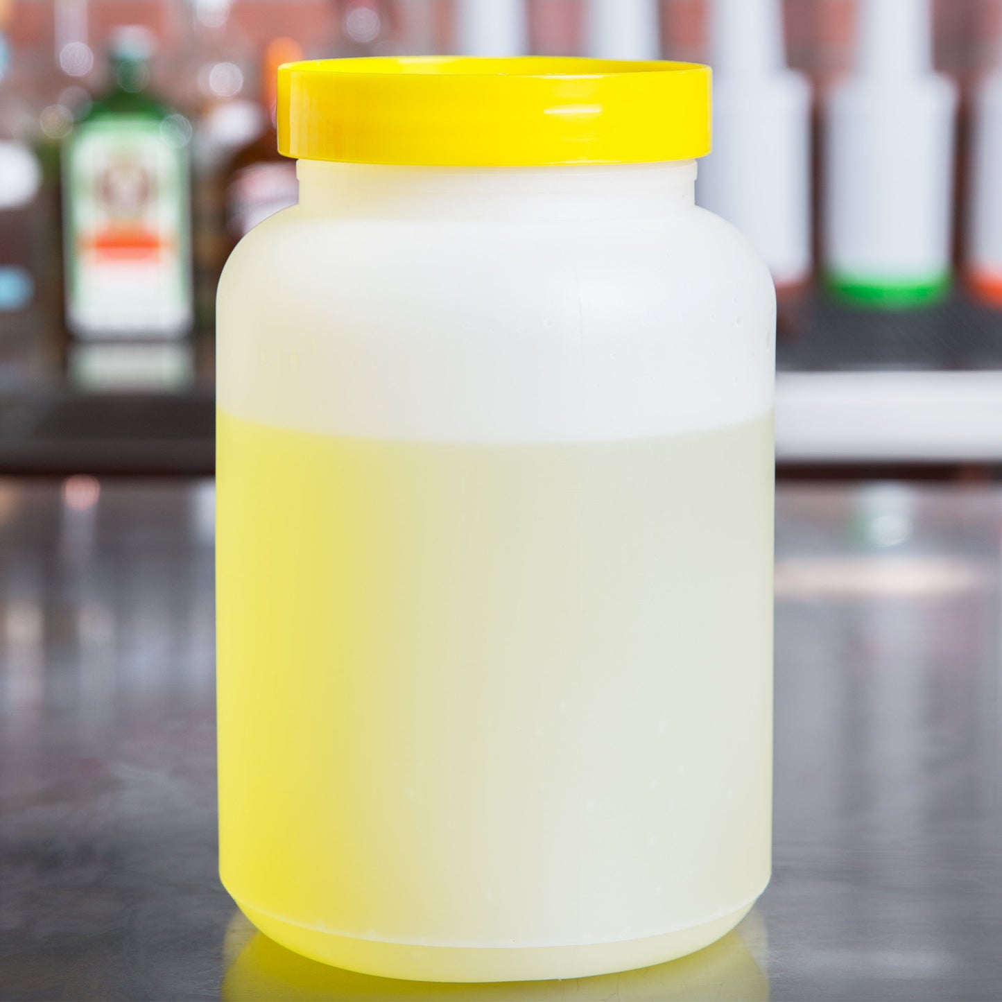 2 QT. WHITE POUR BOTTLE WITH YELLOW SPOUT AND CAP